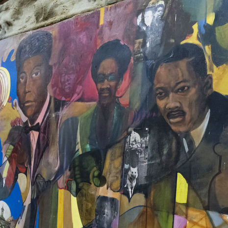 Image of Black history mural inside the Church of Advocate.