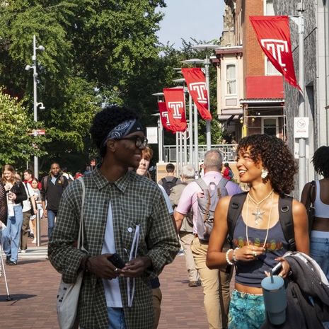 Students walking on campus during the first day of classes.