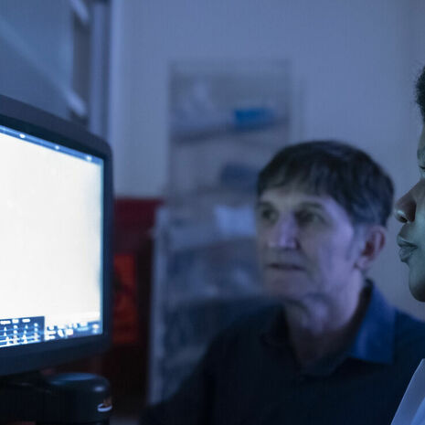 Image of Xavier Graña and an undergraduate student researcher.